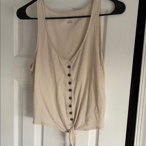 Button down tank top with a tie at the bottom